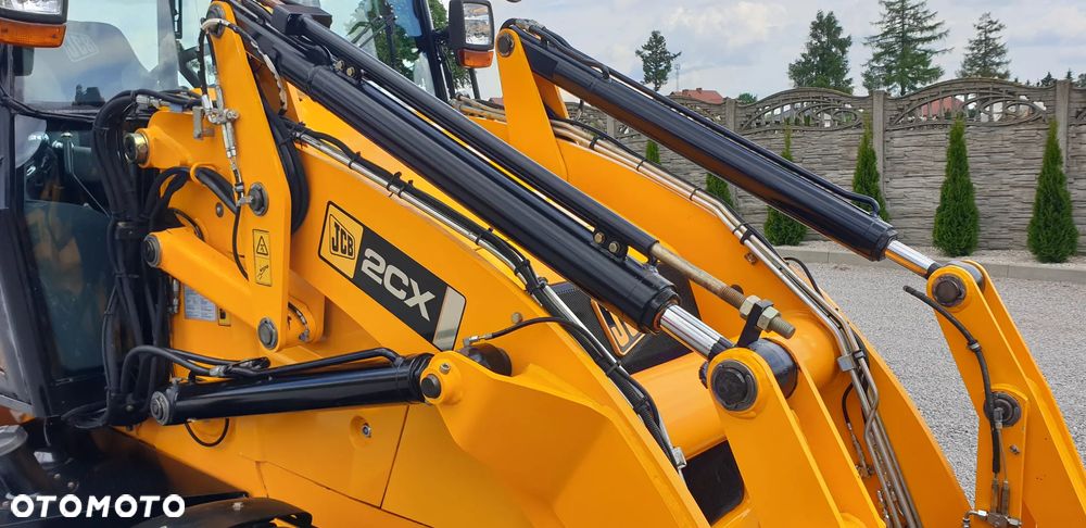 JCB 2CX tylko 2835mtg! z ROTOTILT / 3 łyżki /widły/centralne smarowanie/klimatyzacja / STAN IDEALNY !! - 33