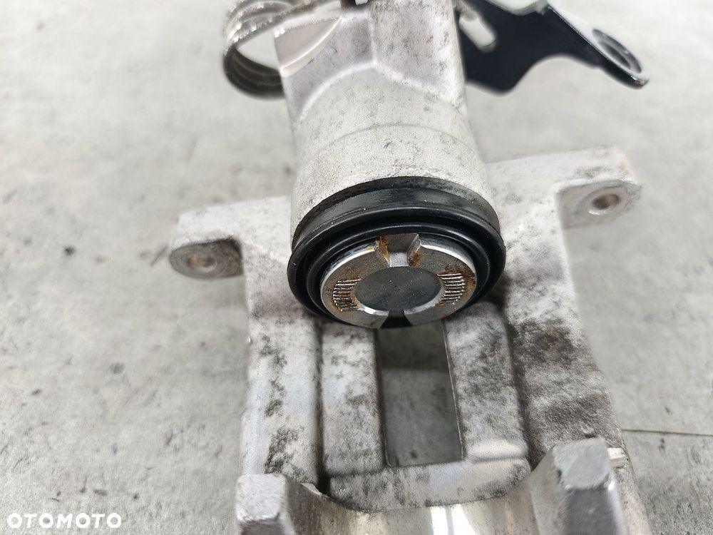 ZACISK HAMULCOWY LEWY TYŁ VW PASSAT B5 FL 1.9 TDI - 7