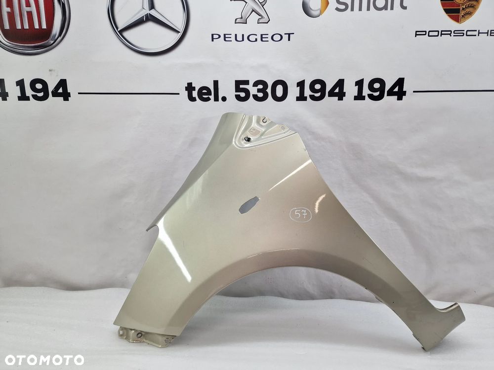 TOYOTA YARIS II LIFT 09-11 LEWY ŁADNY BŁOTNIK PRZEDNI PRZÓD , BEŻOWY METALIK , NR AUKCJI BŁ57 - 1