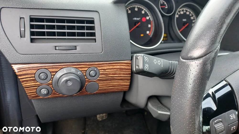 Opel Astra 1.8 Sport - 12