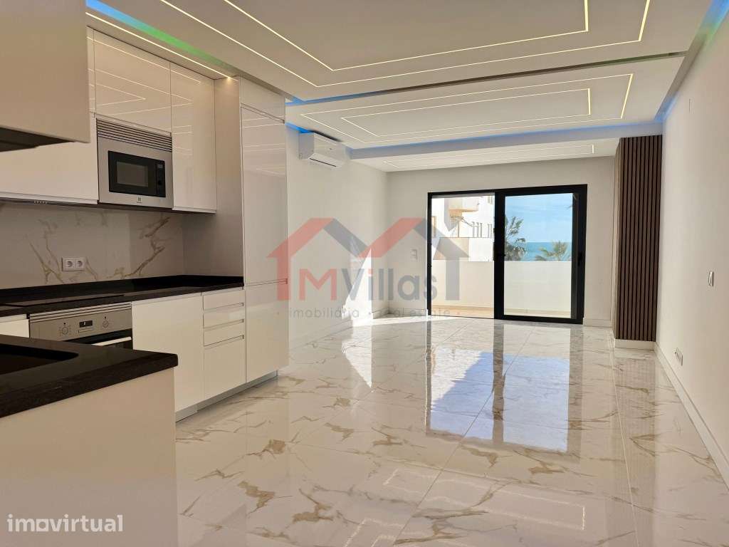 Apartamento T2 renovado com vista mar e garagem a 50m da praia - Qu... - Grande imagem: 2/27