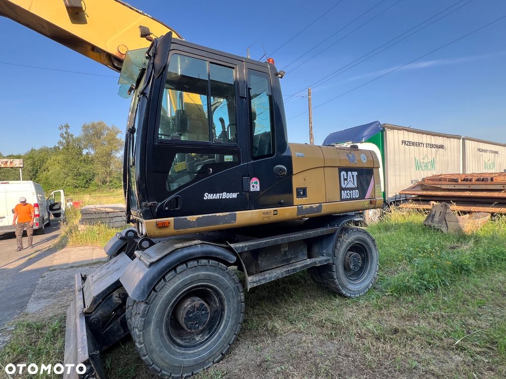 Caterpillar 318 D - 10