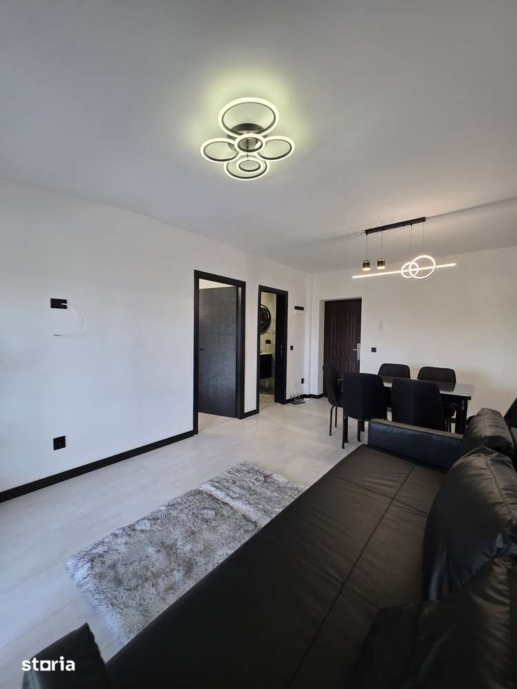 Apartament bloc nou,parcare proprie, mobilat. - Imagine principală: 3/11