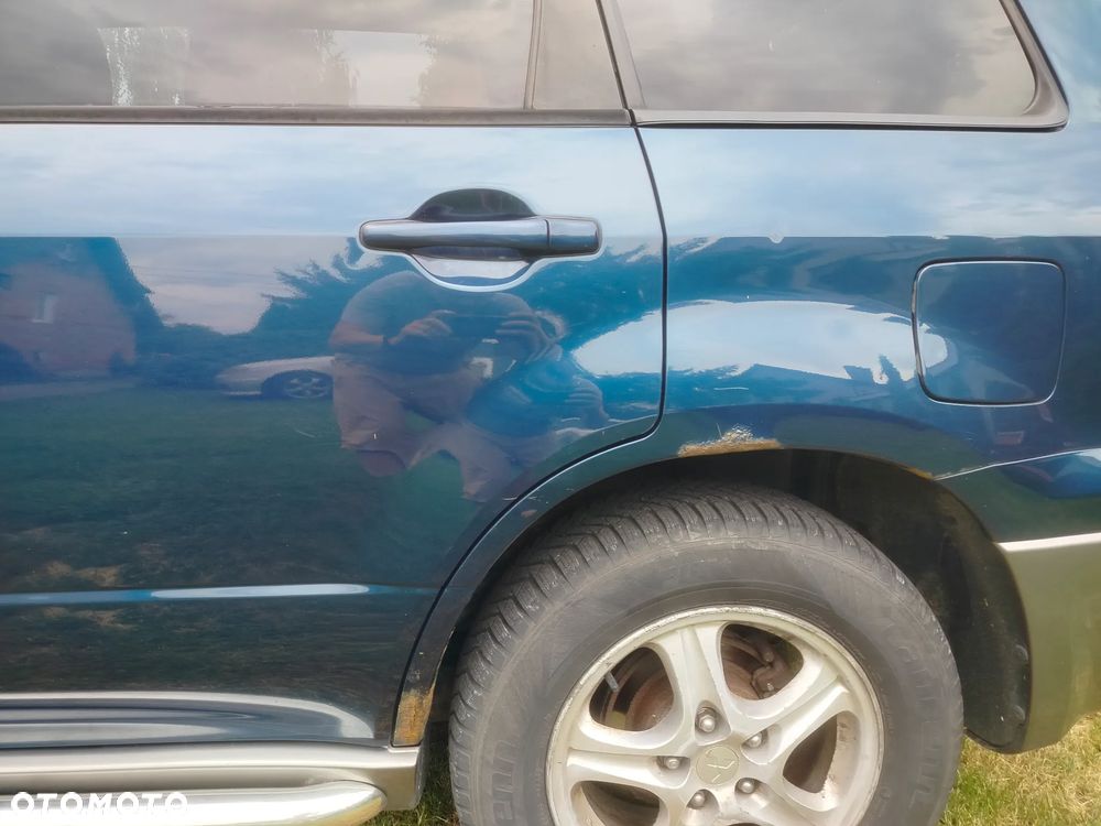 Mitsubishi Outlander 2.0 Comfort 4WD - 12