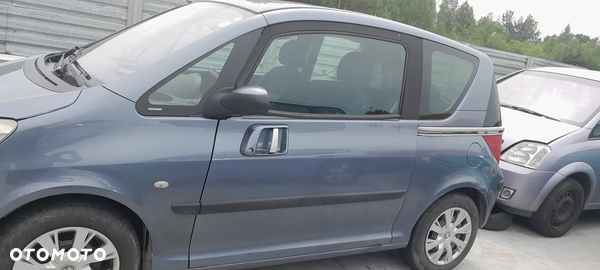 PEUGEOT 1007 DRZWI LEWY PRZÓD PRZEDNIE LEWE EZW nr. 57/5