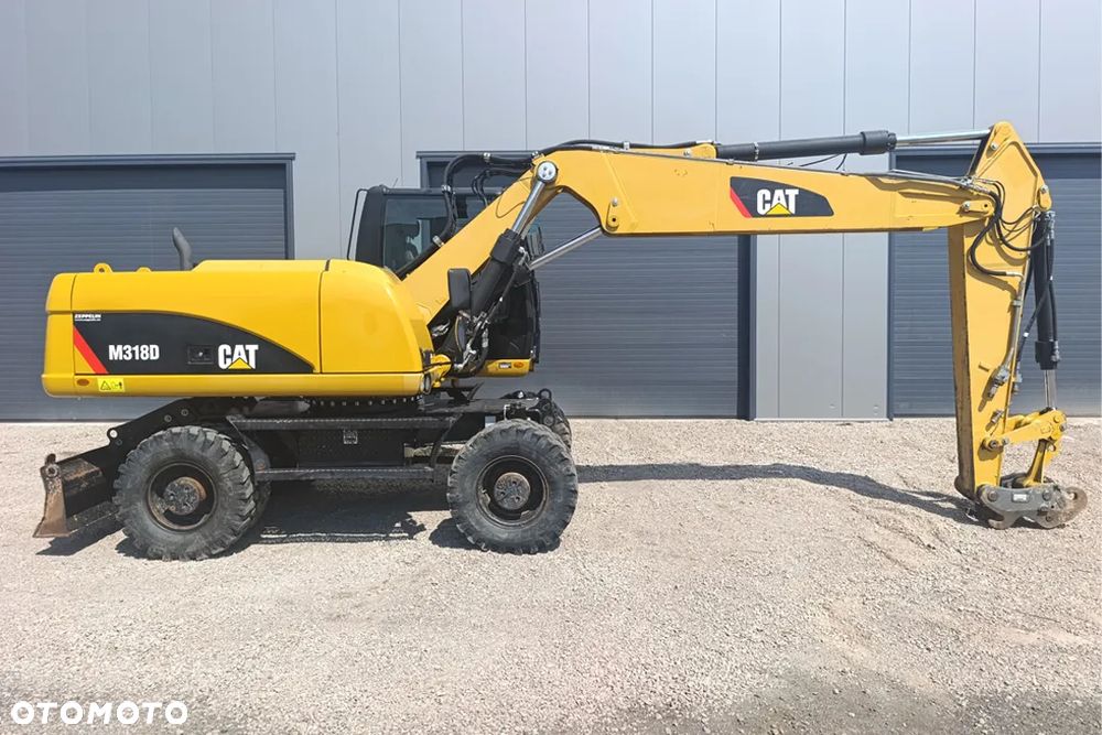 Caterpillar M318D - 1