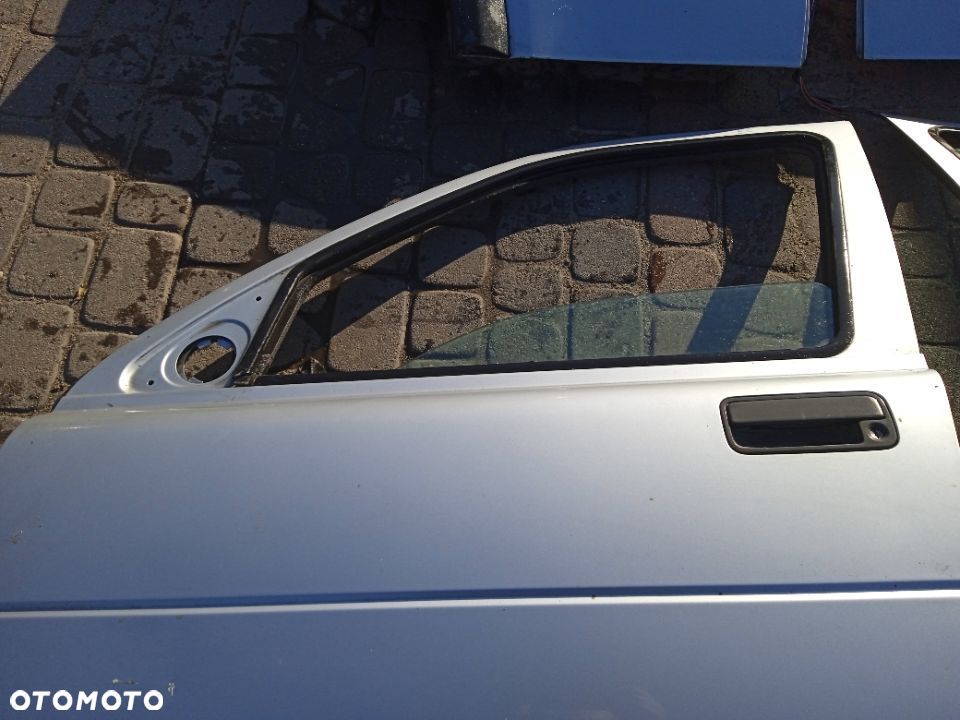 ZAMEK DRZWI LAND ROVER FREELANDER  PRAWE PRZEDNIE 97-06 - 2
