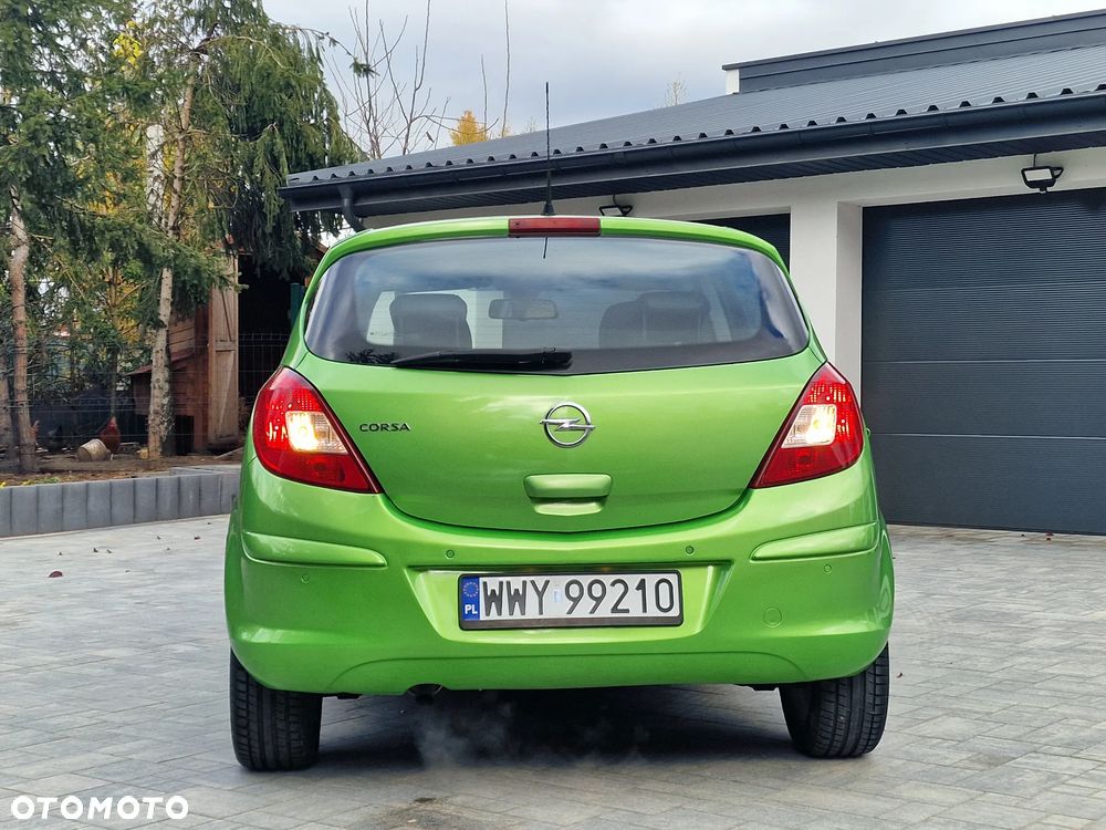Opel Corsa 1.4 16V Cosmo - 34