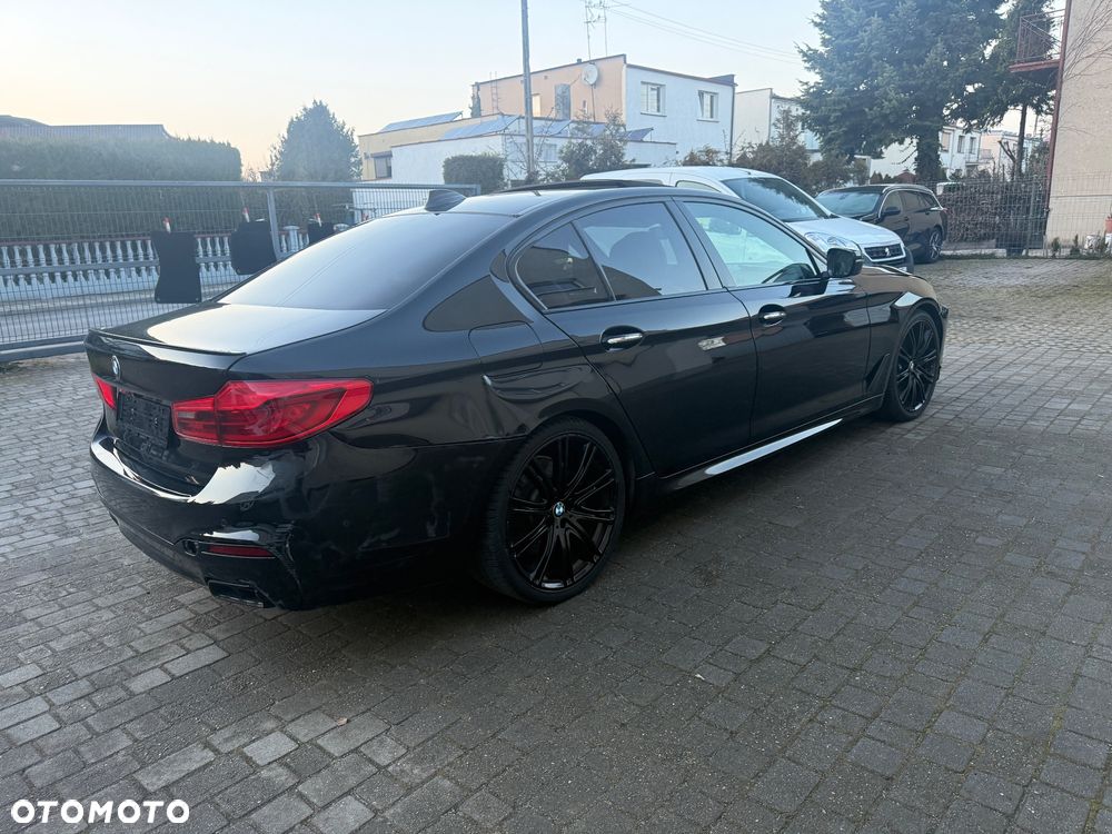 BMW Seria 5 M550i xDrive - 11