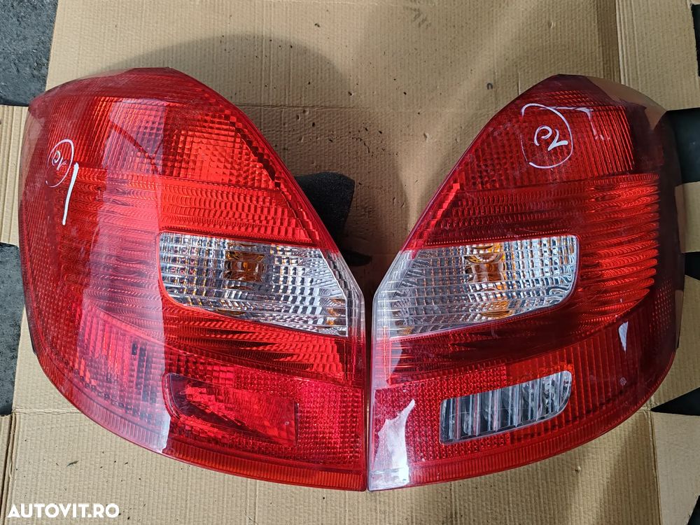 STOP STANGA DREAPTA SPATE SKODA FABIA 2 2007-2015 COD ZSB5J6945095 250LEI/BUCATA - 1