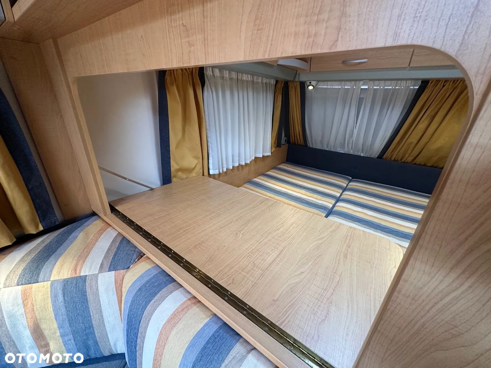 KNAUS 500 SUDWIND z przedsionkiem, napędem i łóżkami piętrowymi. - 30
