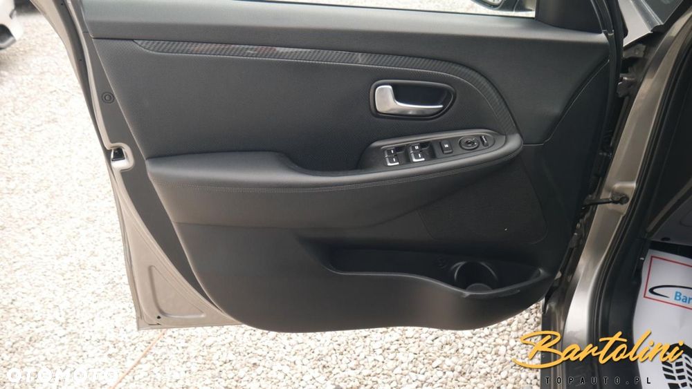 Kia Carens - 11