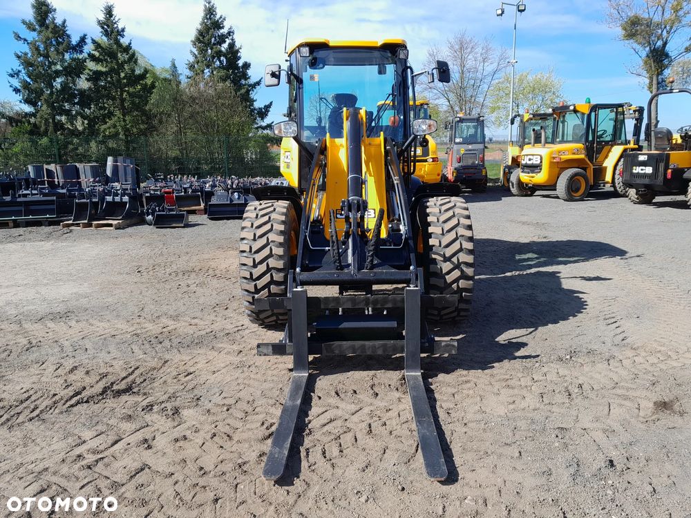 JCB 409 - 4