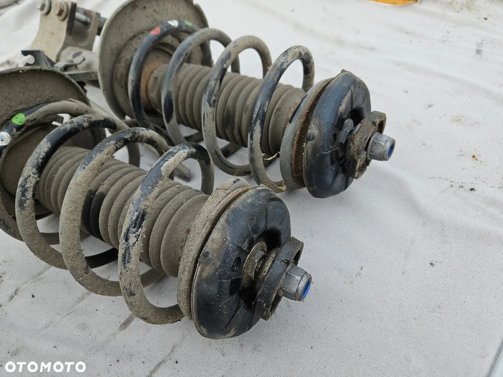 Amortyzator sprezyna McPherson lewy przód Peugeot 3008 I 1,6 THP 2011r 70 tys. km 7043 - 5