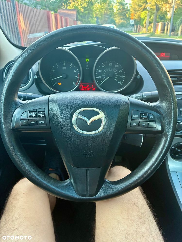 Mazda 3 2.0 Exclusive + - 8