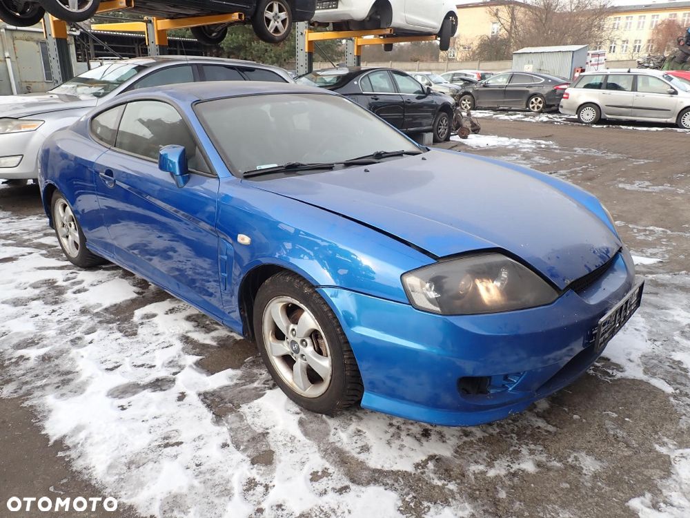 CZĘŚCI - Hyundai Coupe II GK 1,6 16V 105KM G4ED FILM COUPE LIFT 05-07 lakier XX 2006r. INDEX - 9856