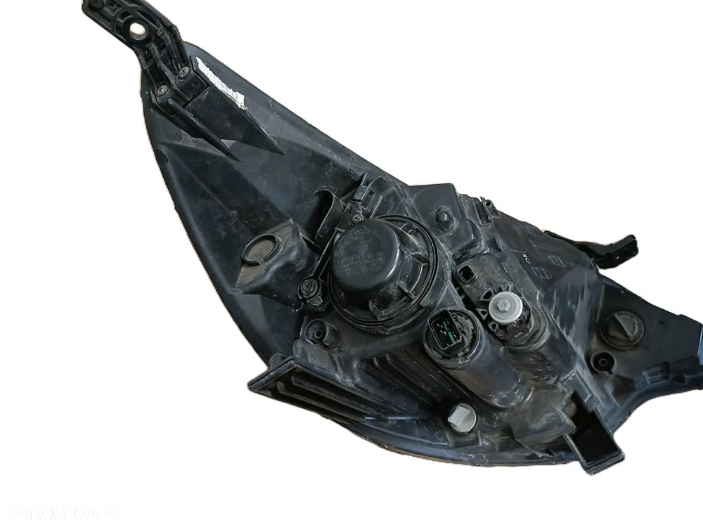 KIA RIO III LIFT 14-17 r. LAMPA LEWY PRZÓD LEWA PRZEDNIA LP EU 92101-1W + - 7