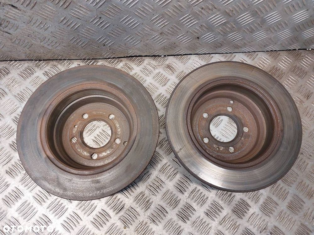 TARCZE HAMULCOWE TYŁ + KLOCKI + ZACISKI VOLVO V70 I - 7