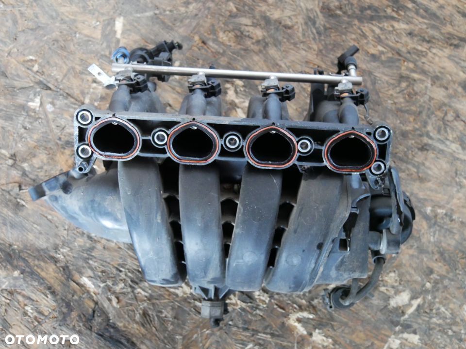 KOLEKTOR SSĄCY OPEL INSIGNIA 1.8B A18XER 55571524 - 2