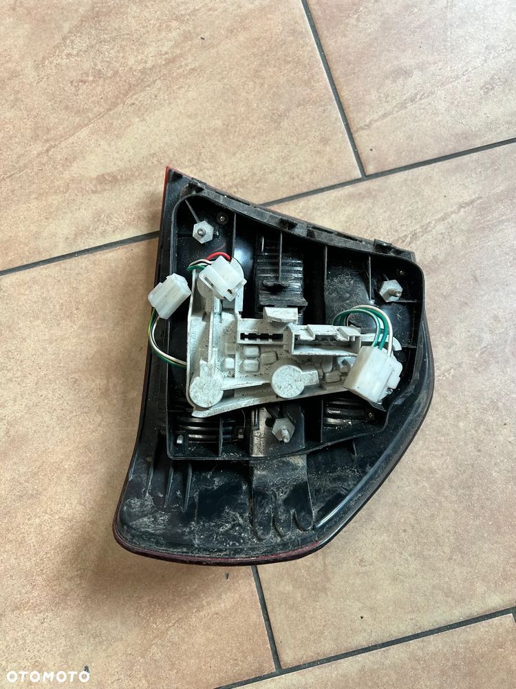 LAMPA BMW E90 LEWY TYŁ PRZED LIFT EU - 2