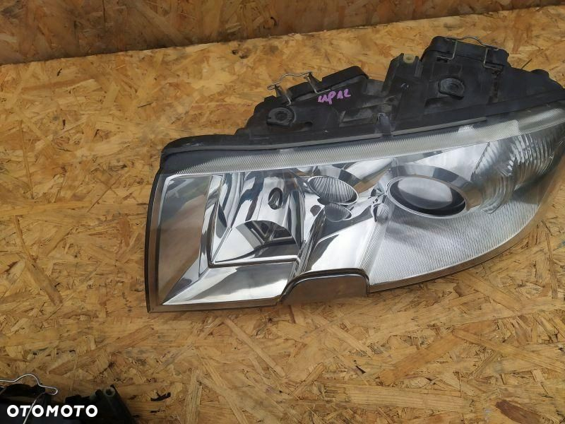REFLEKTOR LAMPA PRAWA + LEWA EUROPA KSENON SKODA SUPERB I 1 - 4