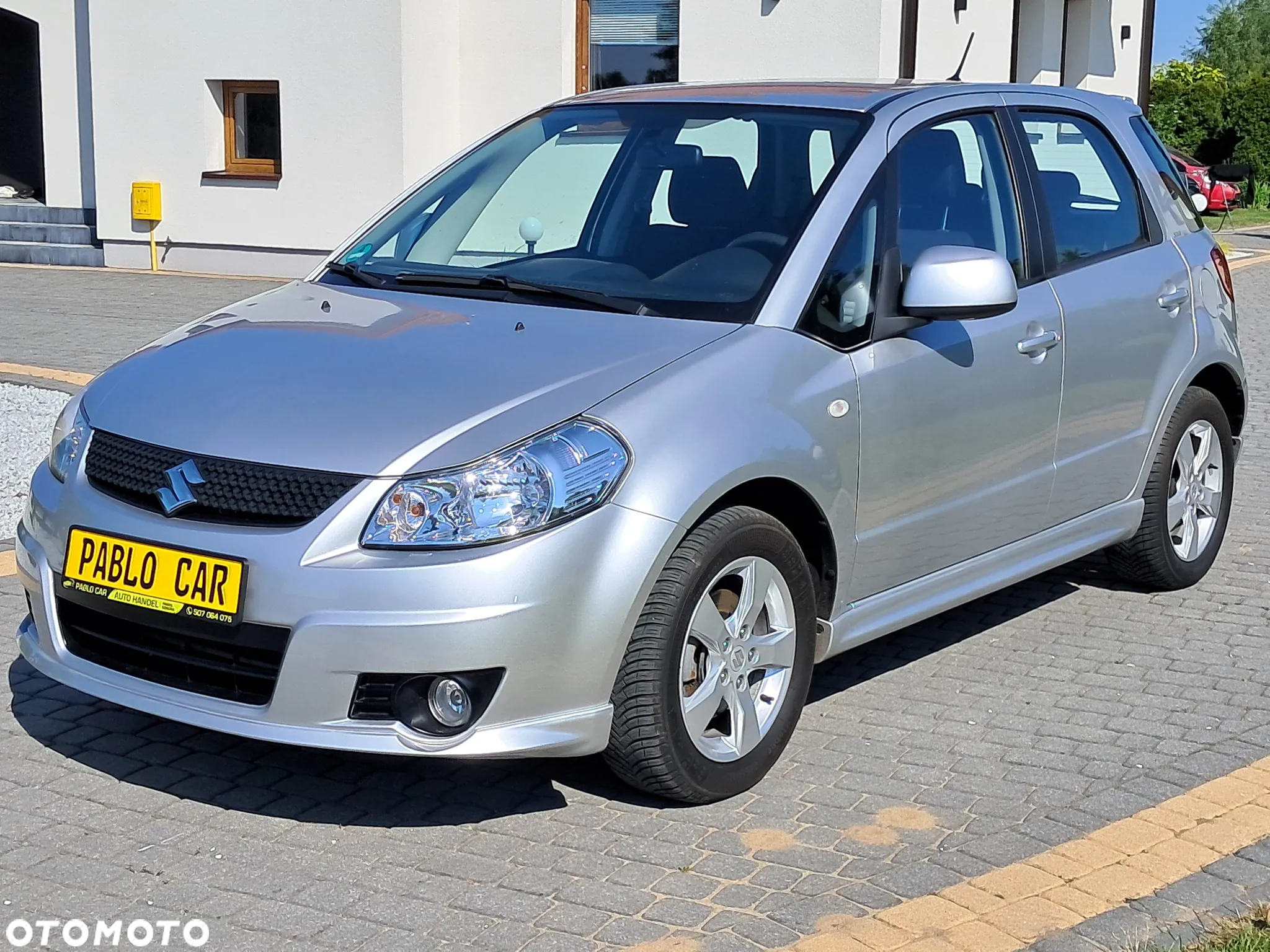 Suzuki SX4 1.6 Comfort Plus - 11