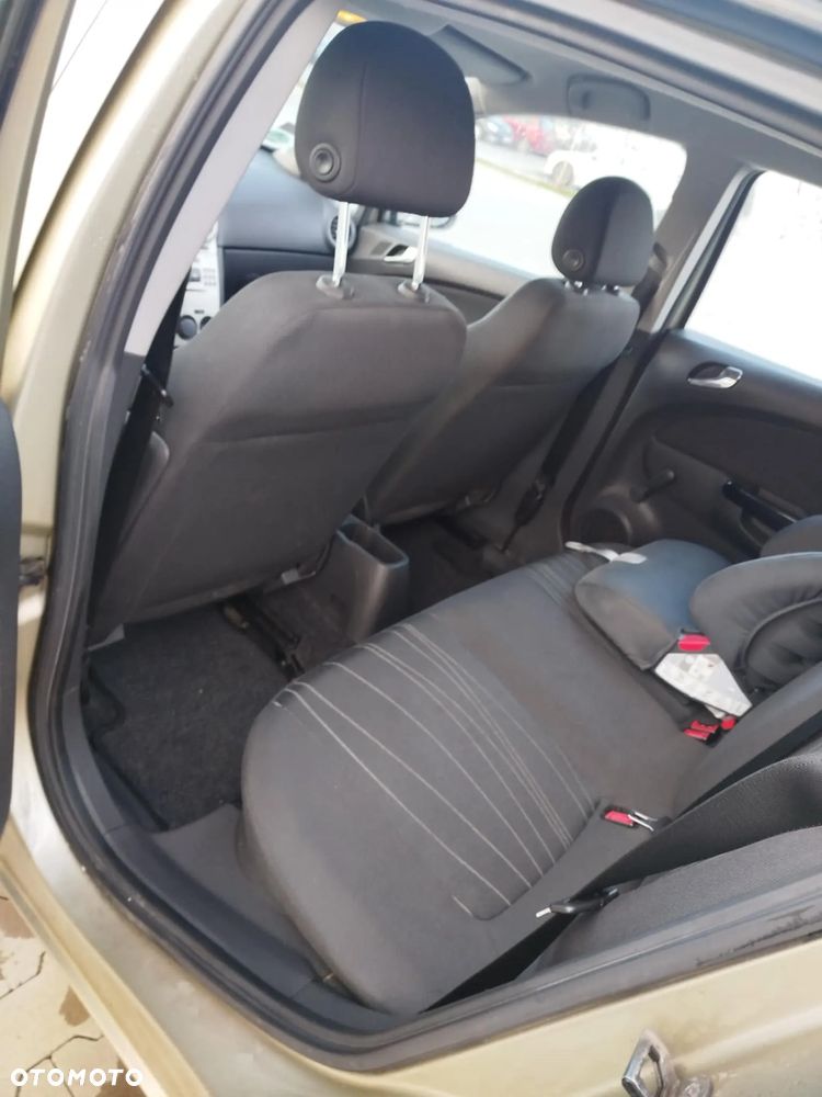 Opel Corsa 1.2 16V Cosmo - 8