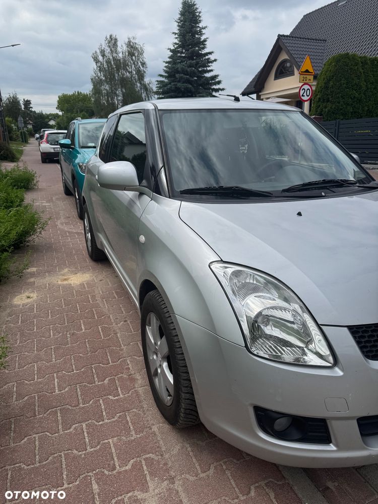 Suzuki Swift 1.3 Club - 4