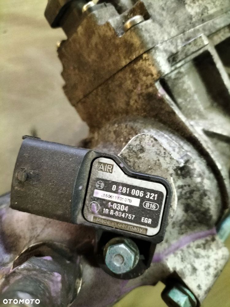 kolektor ssący man tgl 12.220 - 4