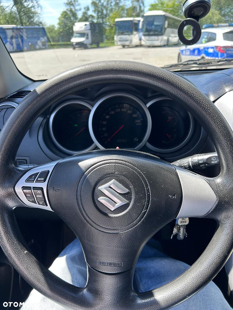 Suzuki Grand Vitara 2.0 - 7