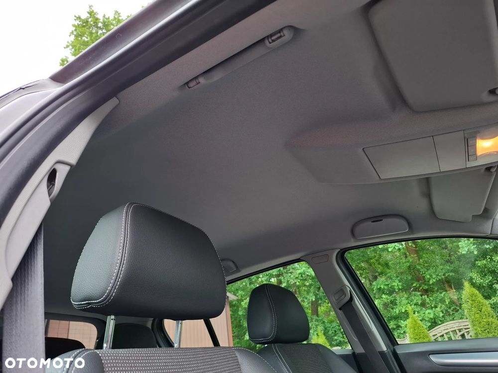 Opel Astra 1.6 Cosmo - 19