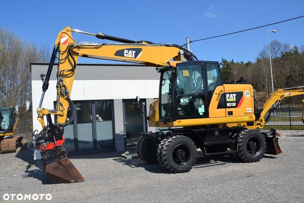 Caterpillar M 315 F, ROTOTILT R5
