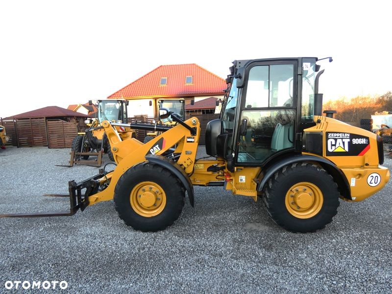 Caterpillar CAT 906H2 Z Niemiec / Org. 2.969mtg / Idealna /