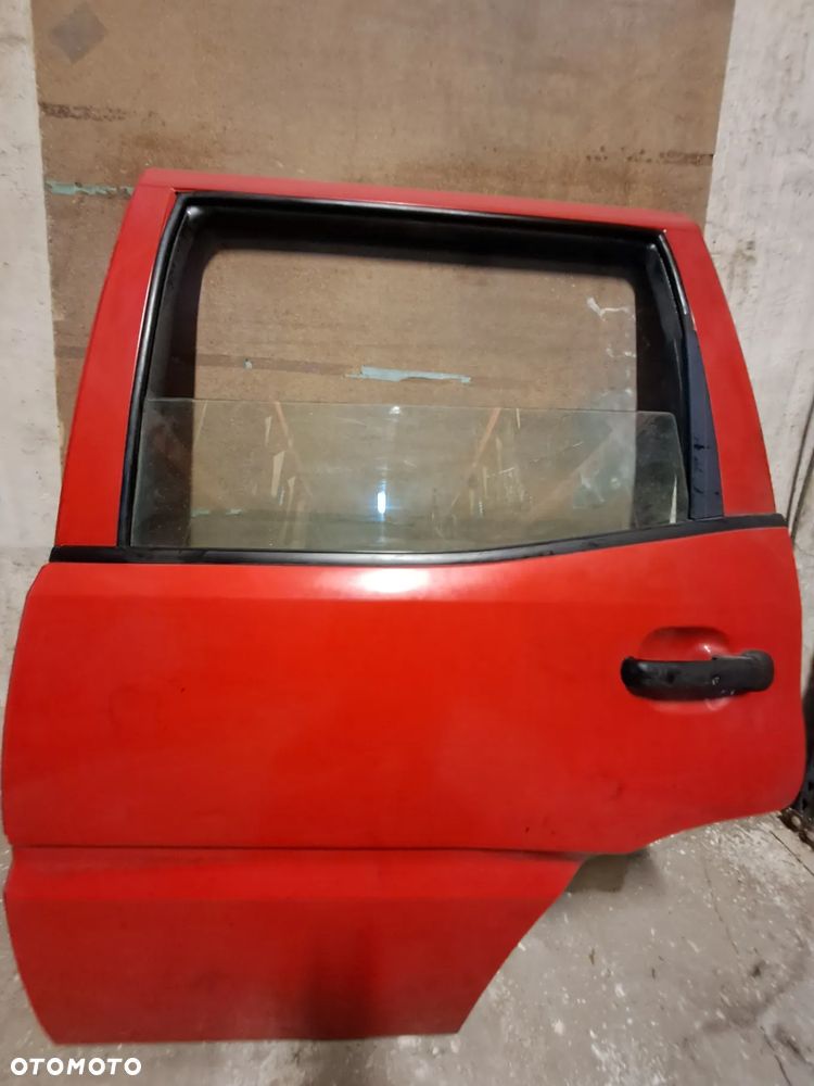 Drzwi Nissan Terrano II 93-03' lewy tył (jasna czerwień)