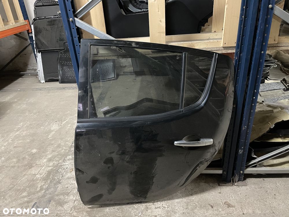 Drzwi Mitsubishi L200 IV lewy tył - oryginalne (czarne) - 1