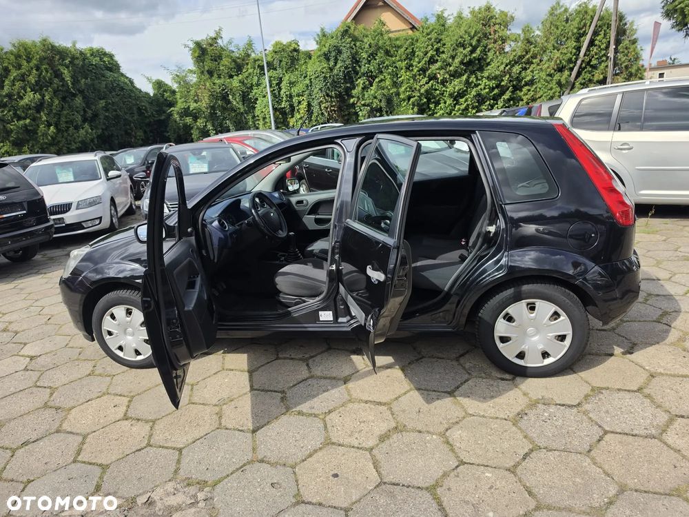 Ford Fiesta 1.4 Ghia - 4
