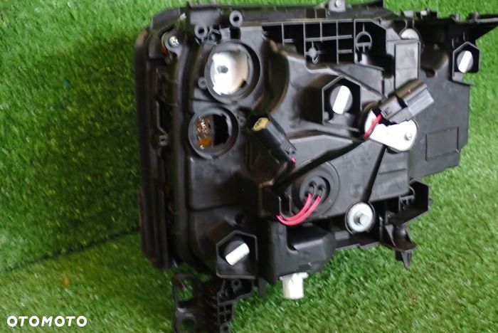 TOYOTA LAND CRUISER J250 J25 24- lampa lewa przednia przód - 10