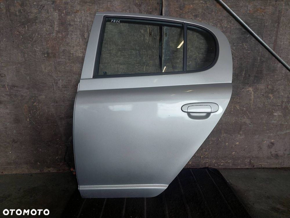 DRZWI KOMPLETNE LEWY TYŁ TOYOTA YARIS I 1E7 ID: 238230 - 1