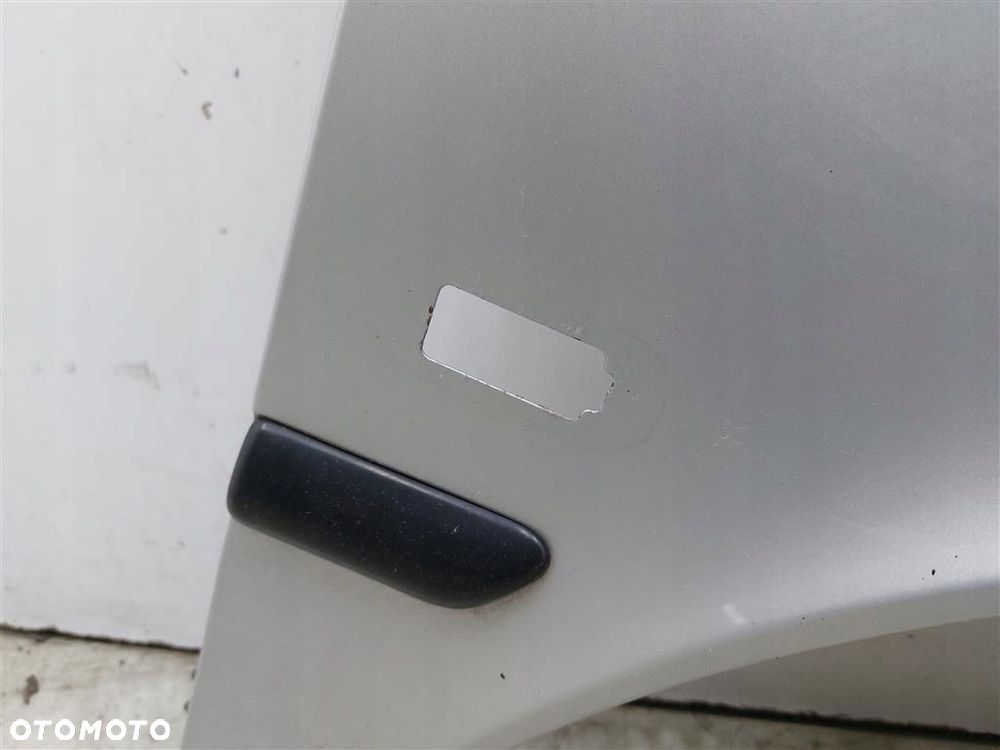 Błotnik przedni prawy Saab 93 I  1998-2002R SREBRNY - 11