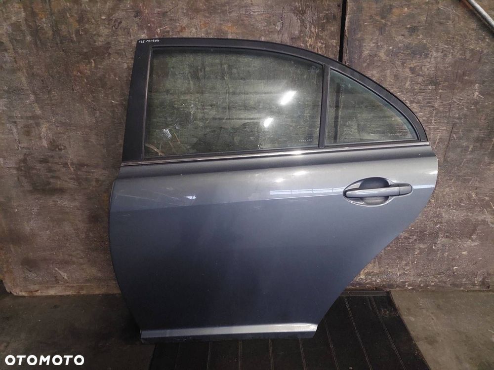 DRZWI KOMPLETNE LEWY TYŁ TOYOTA AVENSIS T25 HB 5D 1E5 - 1