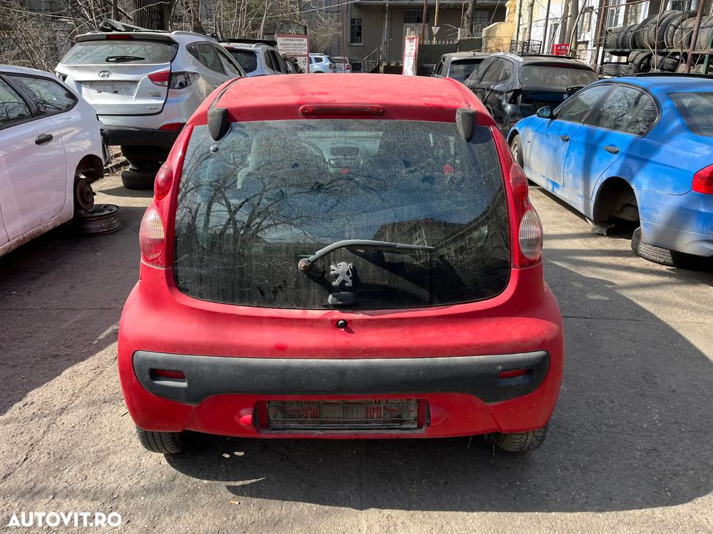Dezmembrez Peugeot 107 rosu 2007 1.0 benzina 4usi - 13