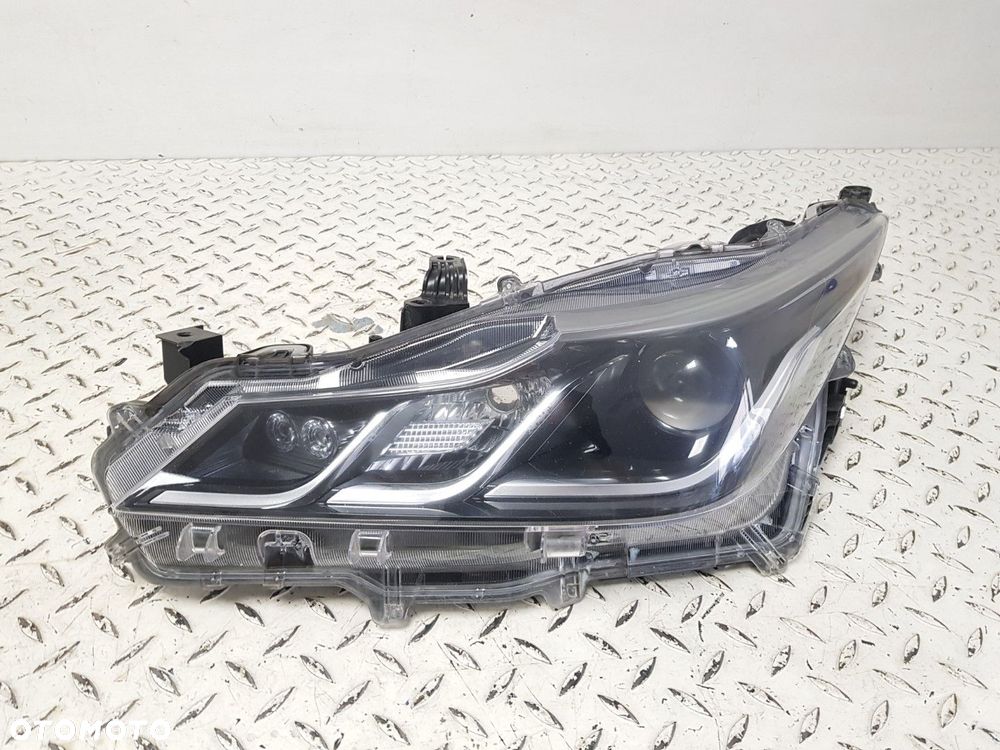 LAMPA LEWA TOYOTA COROLLA XII E21 18-24 SEDAN REFLEKTOR SOCZEWKA EUROPA IDEALNA  81150-02T31 - 2