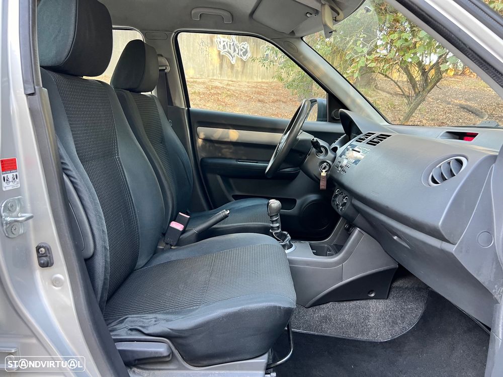 Suzuki Swift 1.3 DDiS GLX - 9