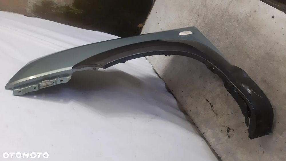 * BŁOTNIK PRZEDNI PRZÓD LEWY HYUNDAI TUSCON I OLIWKOWY KOLOR BU - 3
