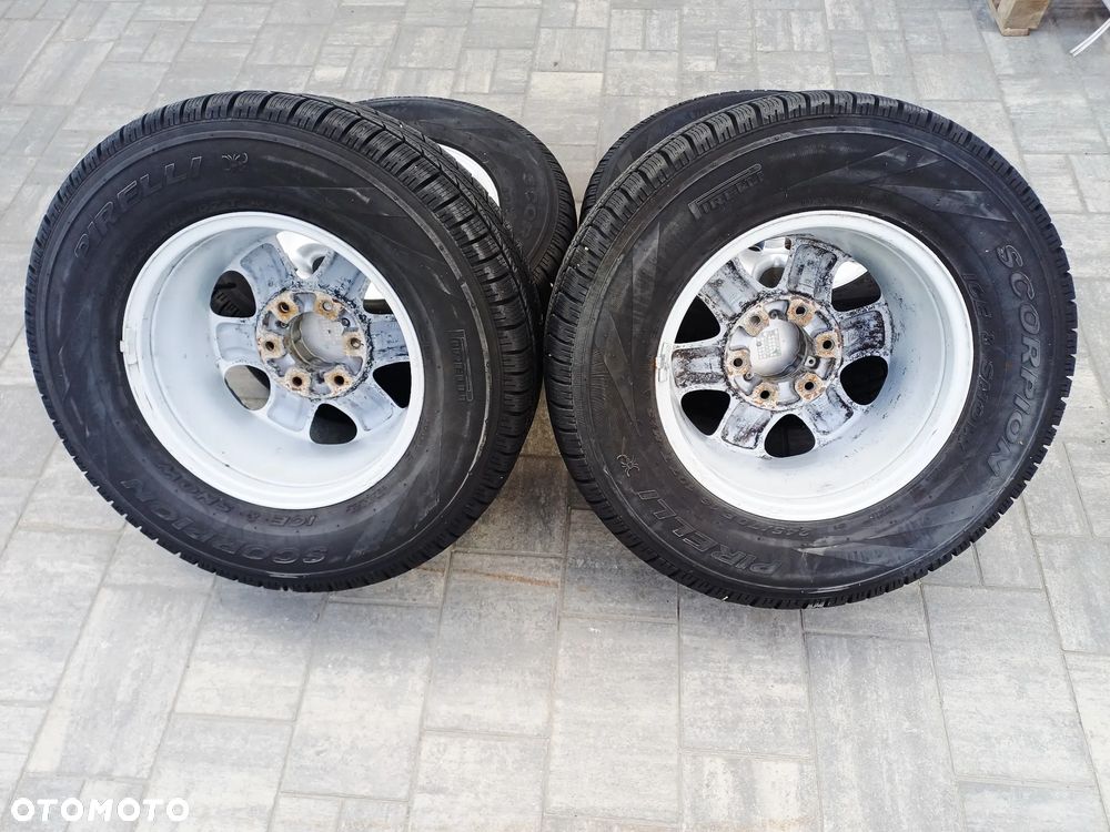 FELGI Z OPONAMI KOŁA ALUMINIOWE OPEL FRONTERA B R16 6X139.7 7Jx15CH-38 106.1 mm NR25 - 12