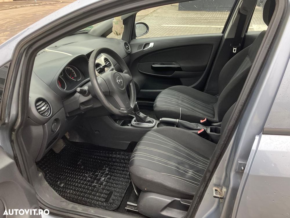 Opel Corsa 1.4i Aut Cosmo - 11