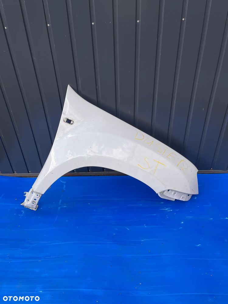 DACIA DUSTER I BŁOTNIK PRAWY PRZÓD PRZEDNI 631244608R