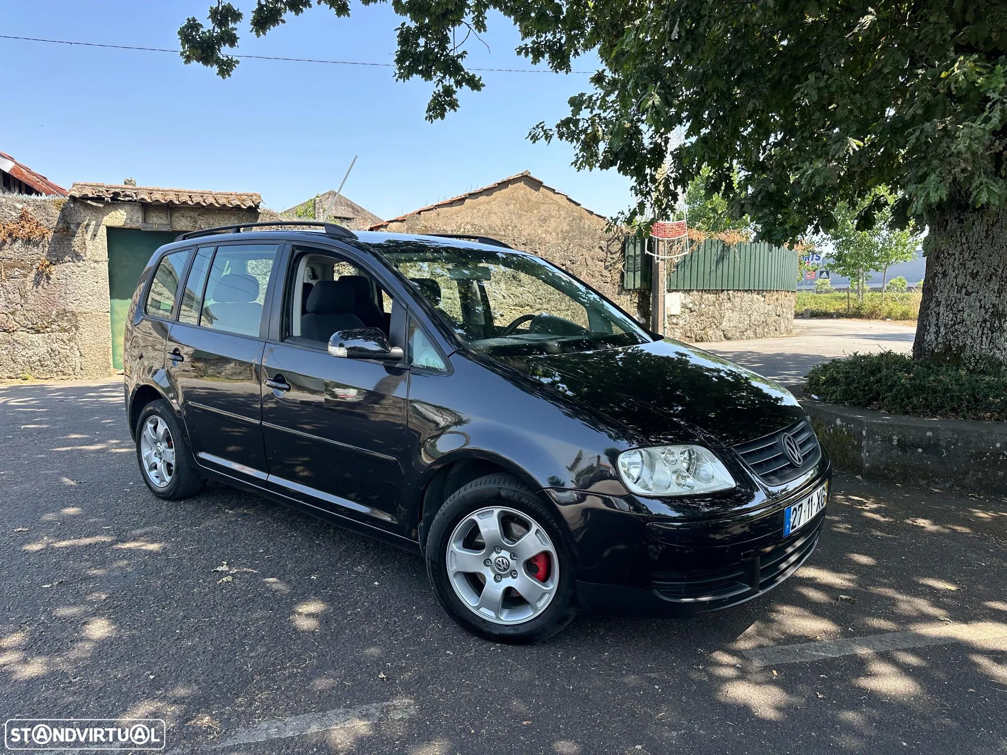 VW Touran 1.9 TDi Highline EC 7L - 1
