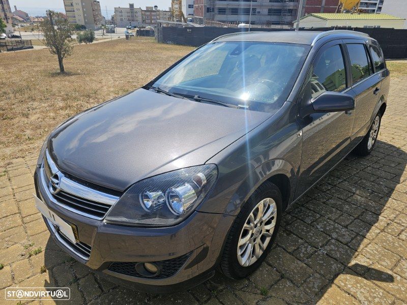 Opel Astra Caravan 1.7 CDTi Cosmo Plus - 1