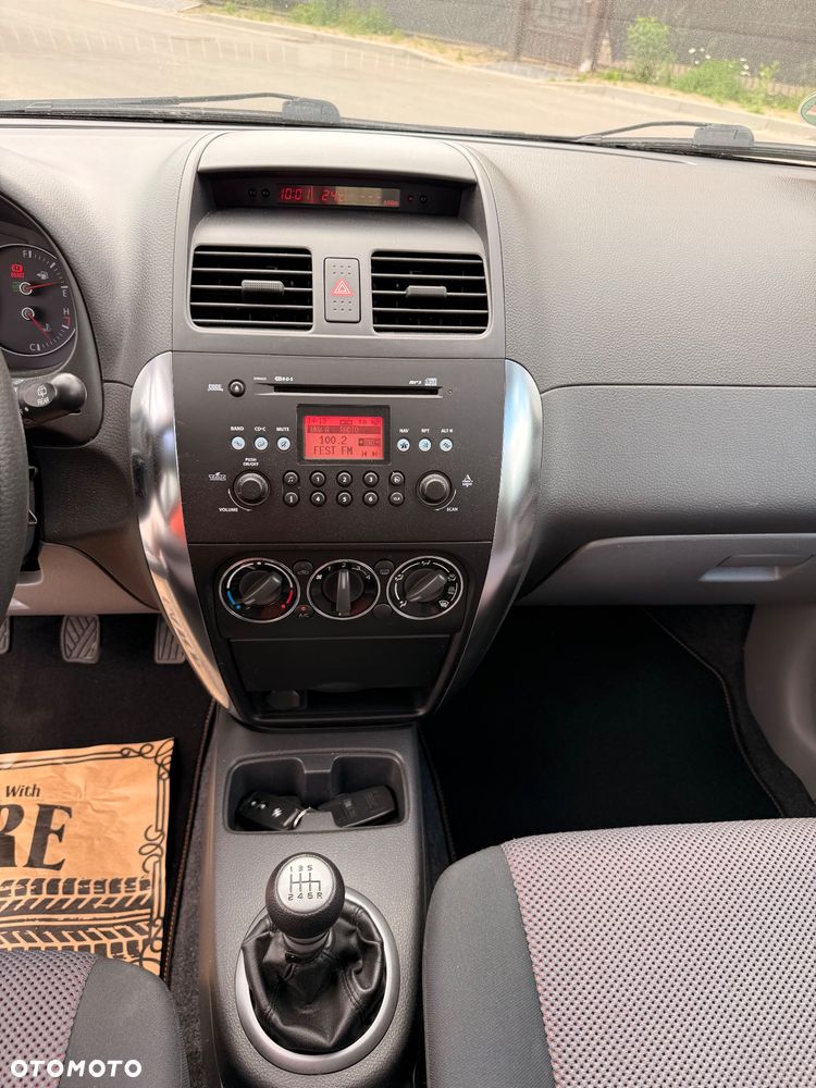 Suzuki SX4 1.9 DDiS 4WD GS / Premium - 31